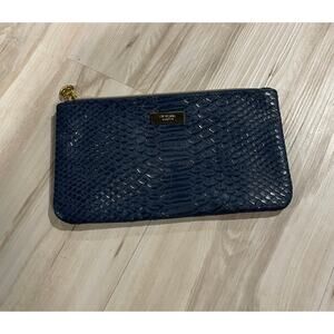 Cle de peau beaute navy snakeskin makeup bag